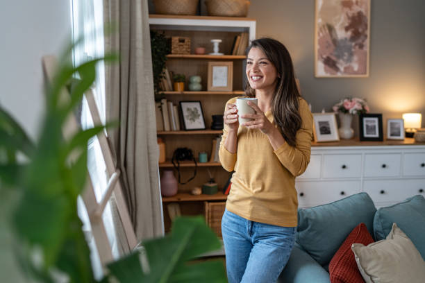 istock A young woman enjoys her morning coffee 2177970973