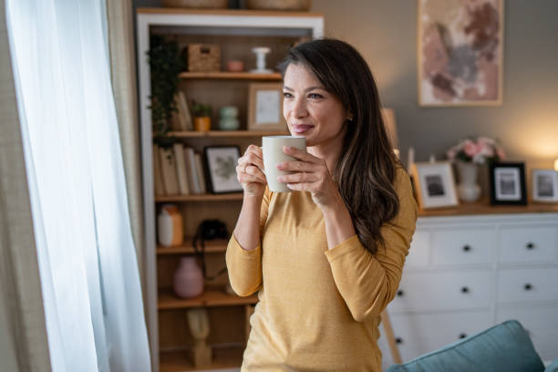 istock A young woman enjoys her morning coffee 2177971089