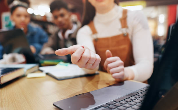 istock Group, hands and typing with laptop, education and browsing of web, library and friends with technology. College students, typing and preparation for test, research and books for knowledge and people 2177975210