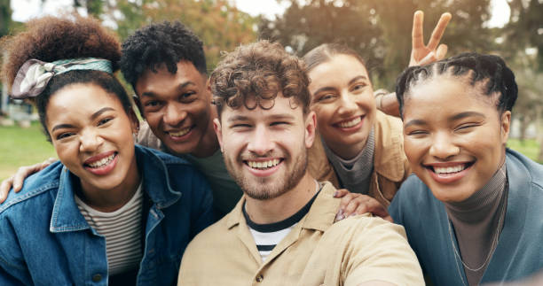 istock Selfie, students or smile in portrait on campus for university memory, social media post or profile picture update. Study group, diversity or friends in photograph at college with peace sign or happy 2177975563