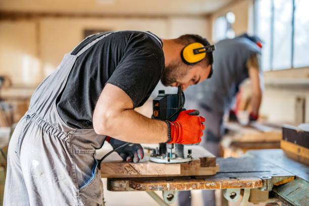 istock Young Male Carpenter Sanding The Wood In His Workshop 2177977249