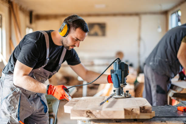 istock Young Male Carpenter Sanding The Wood In His Workshop 2177977724