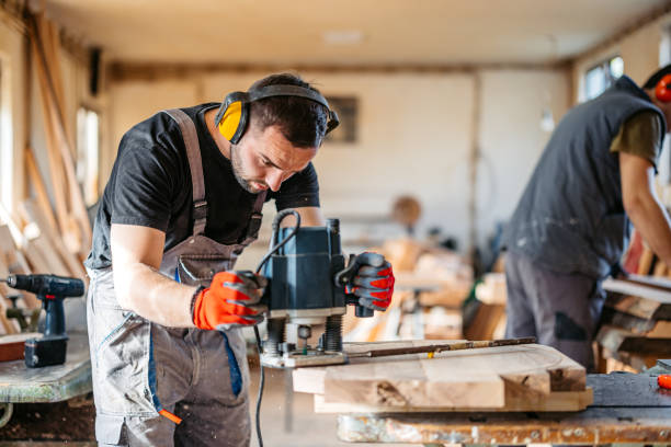 istock Young Male Carpenter Sanding The Wood In His Workshop 2177978196