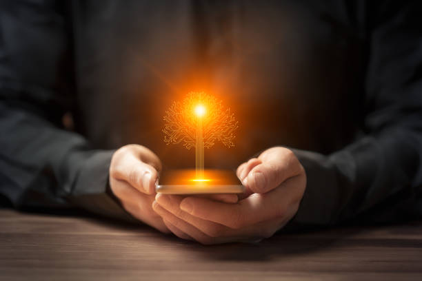 istock Artificial intelligence new life tree symbol on smartphone in hand 2177980139