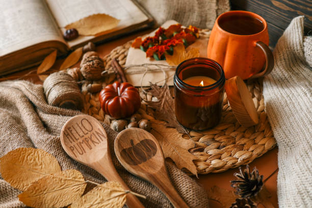 istock Burning candle in a cozy warm homey autumn atmosphere 2177985849
