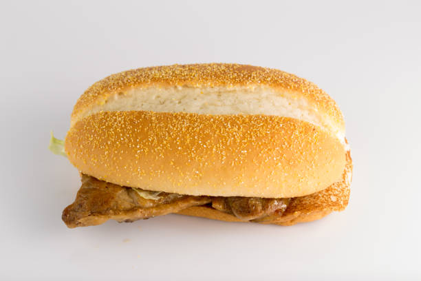 bun in hand, man holding bun in hand, fast food concept