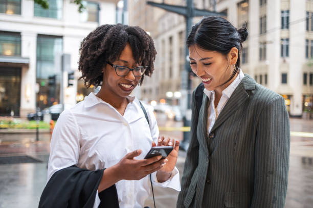 istock Two business women smiling while commuting in Houston 2177987980