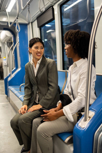 istock Two business women having a discussion on commute in Houston 2177987998