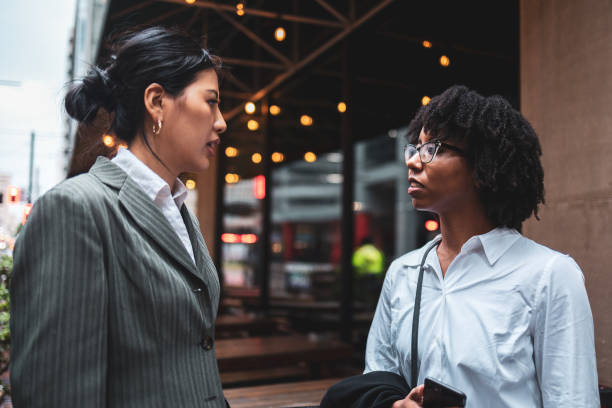 istock Two business women having a discussion while commuting in Houston 2177988000