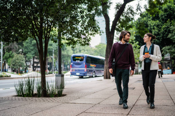 istock Coworkers talking and walking in Mexican city 2177996918