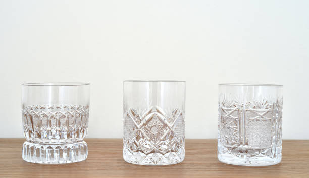 istock Elegant empty crystal glasses on the table 2178001309
