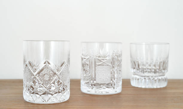 istock Elegant empty crystal glasses on the table 2178001320