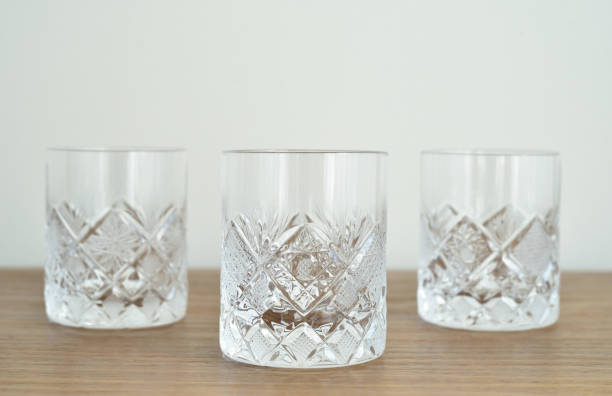 istock Elegant empty crystal glasses on the table 2178001345