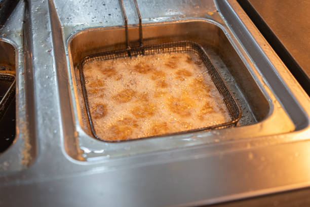 istock Chicken nuggets in frying baskets 2178006420