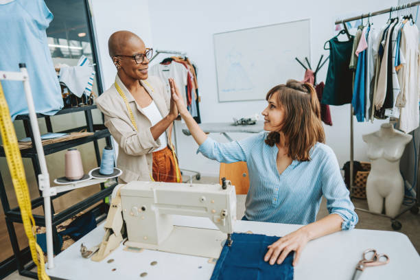 istock Teacher in the sewing studio teaching the student how to sew 2178006581