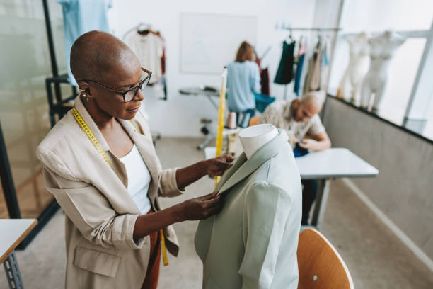 istock Seamstress in the stylist sewing studio 2178006661