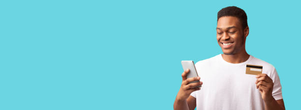 istock Black businessman making purchases using cell phone 2178014315