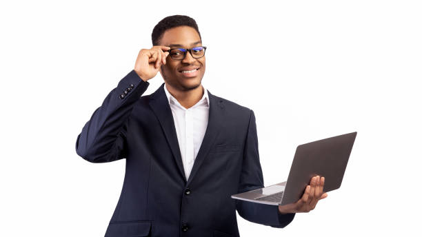istock Smiling african american guy with laptop at studio 2178014331