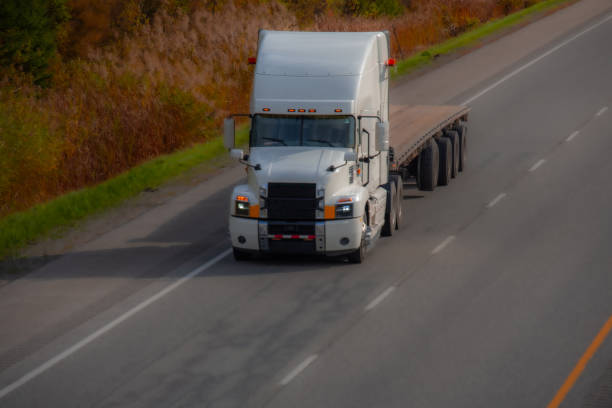 istock Heavy truck on a Canadian highway 2178014899