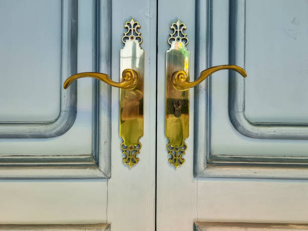 istock Handles on an old wooden door. 2178017765