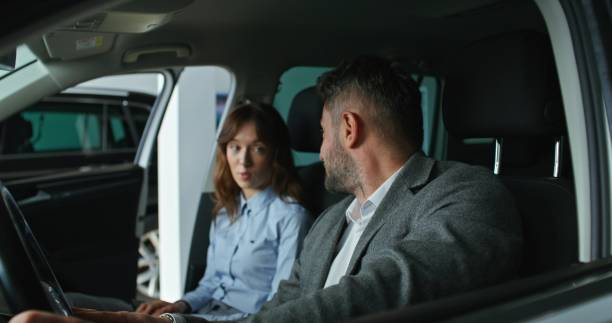 istock A man in a car dealership 2178020827