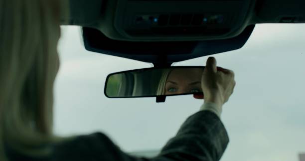 istock A woman is driving a car 2178021101