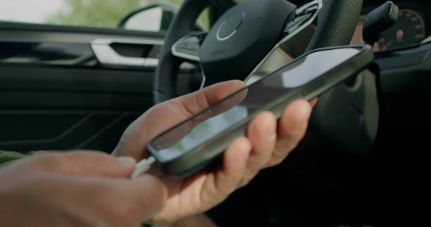 istock A man is driving a car 2178021491