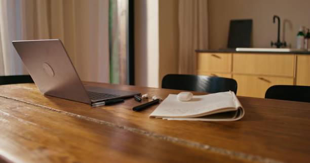 istock A man uses a laptop indoors 2178022561