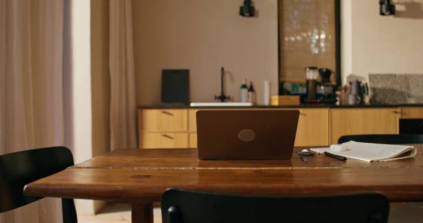 istock A man uses a laptop indoors 2178022562