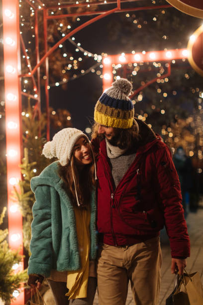 istock Couple walks after shopping 2178023534