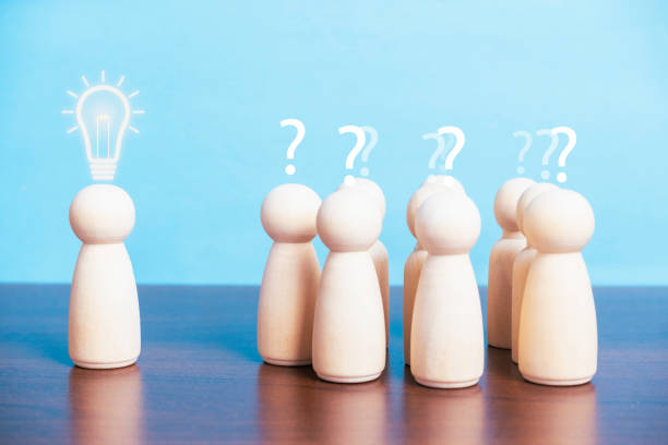 istock Light bulb icon on wooden doll head and others with question mark for creative thinking 2178024632