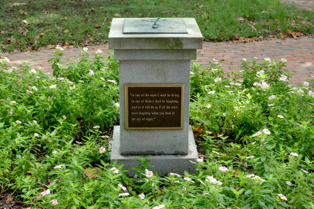 istock Sundial Monument Surrounded By Vibrant Blooming Flowers. 2178028667