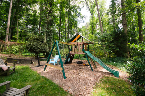 istock Backyard Playground With Slide And Swings For Kids. 2178028828