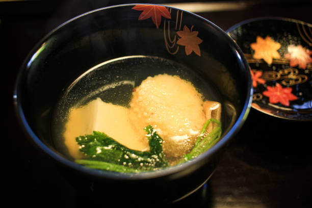 Kaiseki Cuisine (懐石料理/Kaiseki-Ryori) is Japan's artful culinary tradition. Kaiseki cuisine features a set course meal chosen by the chef to highlight a specific seasonal theme.\nO-wan (お椀) is the soup dish. It's a simple dish, but the skill of a kaiseki chef is shown in how they uses the stock and flavor of the ingredients in the soup.