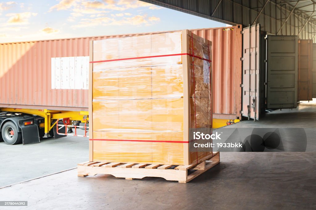 Package Boxes Wrapped Plastic Stacked On Pallets Loading Into Container ...