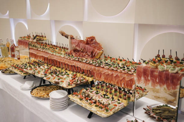 istock Buffet table with smoked meats, ham and syrup. 2178045097