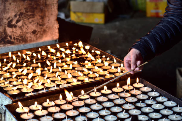 istock lighting of butter lamps 2178045922