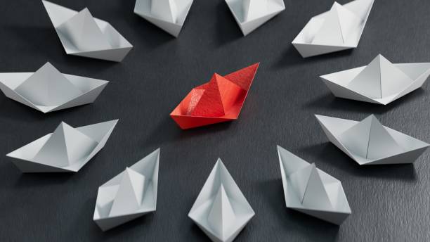 istock Different business concept.new ideas. paper art style. creative idea.3d illustration paper ship and leadership concept.3D rendering on black background. 2178047260