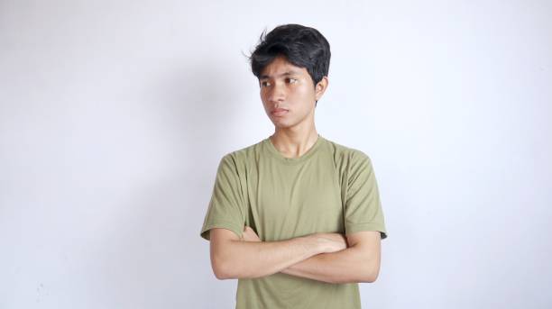 istock Handsome Asian man looking to the right side with crossed arms 2178047302