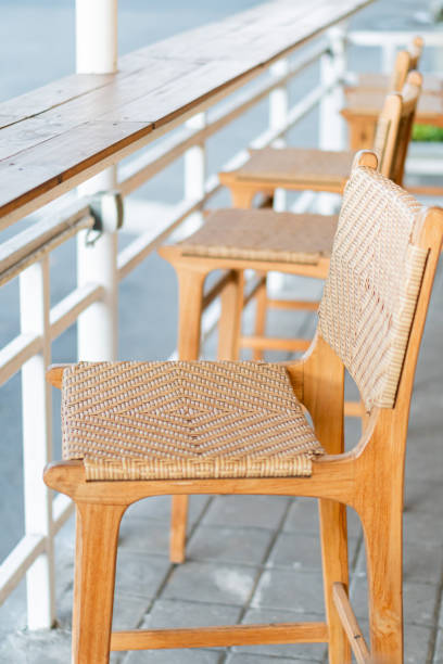 istock Stylish Wooden Bar Stools with Woven Seats 2178048604