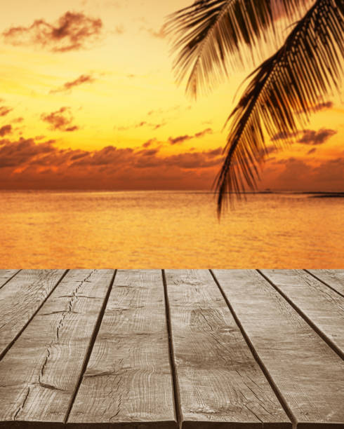 istock Empty wooden table top with tropical ocean sunrise background 2178052071