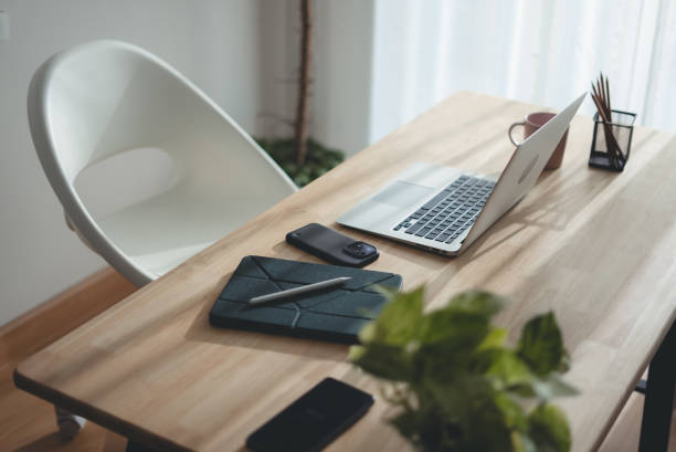 istock Wooden desk with laptop and office supply modern interior. 2178053211