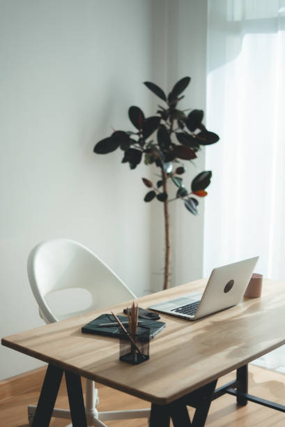 istock Wooden desk with laptop and office supply modern interior. 2178053267