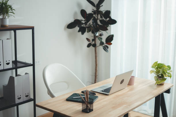 istock Wooden desk with laptop and office supply modern interior. 2178053281