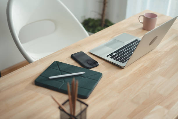 istock Wooden desk with laptop and office supply modern interior. 2178053295