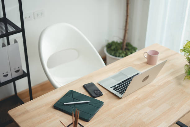 istock Wooden desk with laptop and office supply modern interior. 2178053313