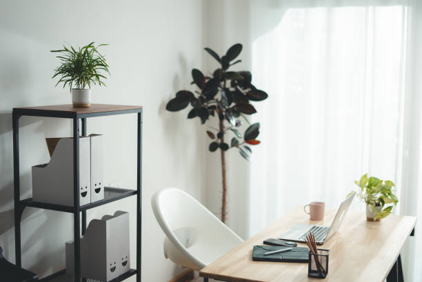 istock Wooden desk with laptop and office supply modern interior. 2178053321