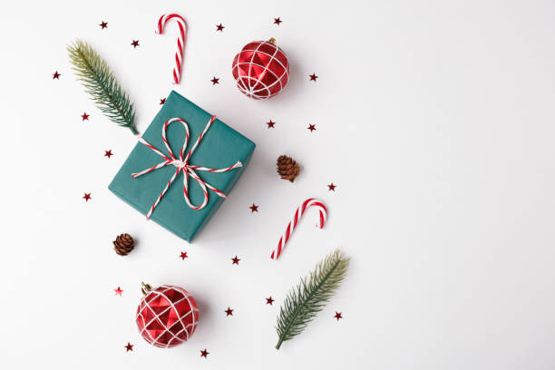istock A green gift box with Christmas decorations and candy canes 2178053510