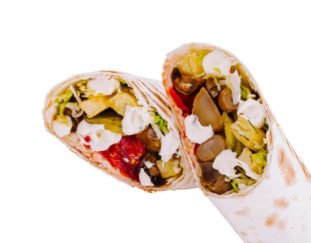 istock Delicious shawarma with fried potatoes, mushrooms and vegetables is lying on a white background 2178053908