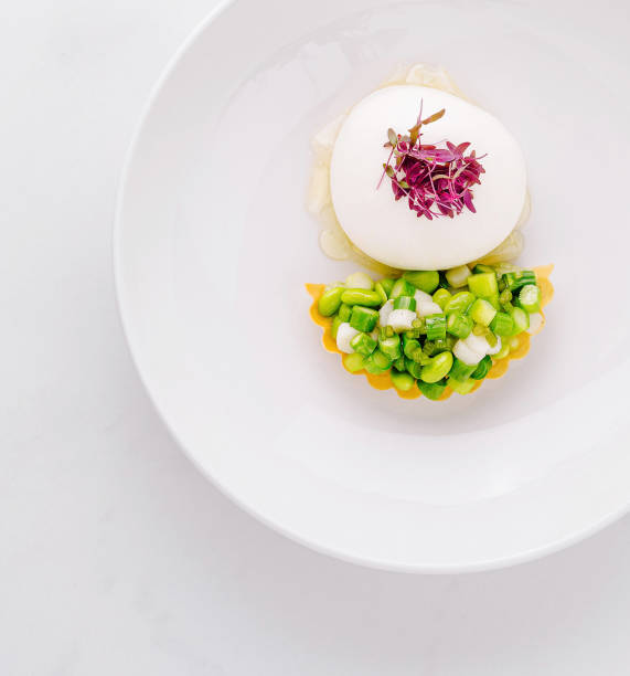 istock Gourmet appetizer dish with vegetable tartlet and creamy mousse on white plate 2178055900